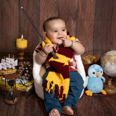 This little one is ready for his first year at Hogwarts. I love his curious expression as he holds the wand. Themed shoots are a wonderful way to show your child's personality.