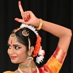 A student's arangetram is a testament to my teaching philosophy. This image of Anvita Jain showcases the precision in form and expression that we cultivate, even for students with no prior background in South Indian culture.