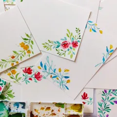 A collection of hand-painted watercolor postcards we created for a Lenovo corporate event. These floral cards are a beautiful, personal way to connect, and we love working on bulk orders for special occasions.