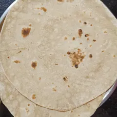 Simple, soft, and wholesome whole wheat chapatis, made fresh every day. They are the perfect canvas for scooping up my delicious curries and sabzis.