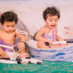 Double the sailors, double the fun. Our nautical boat prop is large enough to comfortably and safely seat two toddlers for an adorable beach-themed twin photoshoot.