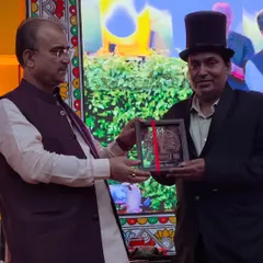A full-stage view of the moment I received the award from the Health Minister. It was a proud moment for me, shared with a wonderful audience.