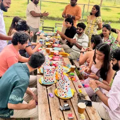It's not just for the dogs. Pet parents get to relax and socialize too, seen here enjoying a clay-making activity during Rio's "Two Sweet" birthday celebration.
