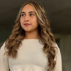 Look at the beautiful flow of these curls and the seamless color blend, all done by a student. This is the level of quality and artistry I train my students to achieve.