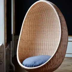 This is one of my most popular items, a custom-made hanging egg chair. It is meticulously woven from high-quality wicker to create a strong yet elegant cocoon seat, perfect for a relaxing corner in your home or on a covered balcony.