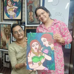 The joy on a student's face as she holds her completed canvas painting is why we do what we do. Our adult art batches provide a relaxing space to unwind and create.