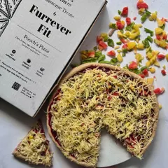For a truly special occasion, I created the Pooch's Pizza. It's a fun, pizza-shaped treat made with 100% dog-friendly ingredients like cottage cheese, beetroot, and carrots. It's a guilt-free way to celebrate with your best friend.