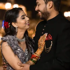 A candid moment of shared laughter between the couple. These unscripted interactions are what make a photo gallery feel alive and real.