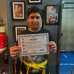 Small steps lead to big achievements. We celebrate every milestone on the martial arts journey, like earning the first yellow belt.