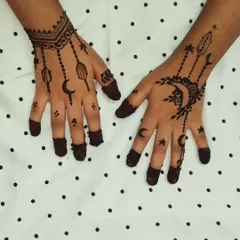 A whimsical and simple design for Eid, featuring crescent moons, stars, and hanging lanterns. This is a fun and festive style, perfect for getting into the holiday spirit.