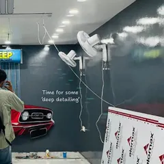 Here's a work-in-progress shot from the Deep Detailing House, showing the classic red car mural taking shape. This piece was designed to evoke a sense of speed and style.