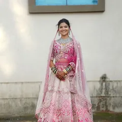 A perfect example of a final portfolio image. This classic pink and white bridal lehenga is one of our most popular rentals for MUAs wanting to showcase soft, elegant makeup looks.