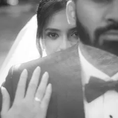 An artistic and emotional portrait from a Catholic wedding. Through creative composition, we aim to capture the profound bond between the couple, creating a timeless and evocative memory.