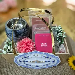 A closer look at our Rakhi hamper, featuring a luxurious wax warmer, a selection of aromatic wax melts, and a beautiful Rakhi. It's a complete gift set designed to make the festival of Raksha Bandhan truly special.