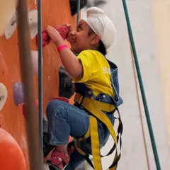 The pure joy of reaching a new hold. We love seeing kids build confidence and strength while having an absolute blast on our colorful walls.