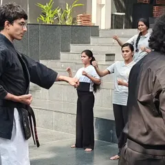 I offer practical self-defense workshops for schools and colleges. Here, my instructors are guiding female students at ISBR Business School through basic techniques, focusing on awareness and escape strategies for real-world safety.