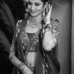 A classic black and white bridal portrait. This timeless style emphasizes the bride's expression and the exquisite detail of her wedding jewellery.