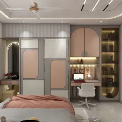 This view shows the functional side of the kids' room, with a full-wall wardrobe, a built-in study desk, and a stylish dressing table. The design uses a soft pink and grey palette.