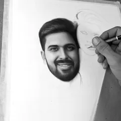 A work-in-progress shot of an A3 size couple portrait commission. Here, you can see one face is fully rendered with realistic shading and detail, while the other is just beginning to take shape from the initial outline.
