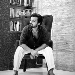 A candid, black-and-white shot. This is me, taking a moment to just be. A choreographer's life isn't always in motion; sometimes it's about quiet reflection.