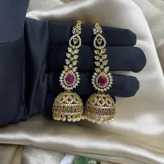 A still image of the AD stone jhumka earrings, showing their intricate design and sparkle.