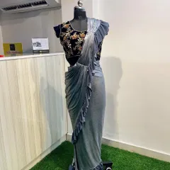 This is my solution for getting a perfect saree look without the effort. It's a pre-draped ruffled saree in a modern grey, paired with a beautiful embroidered velvet blouse.