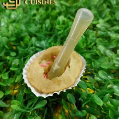 My Pani Puri Bites are a modern, no-mess way to enjoy this classic snack. Each puri comes with a pipette of tangy pani, allowing guests to fill it themselves.
