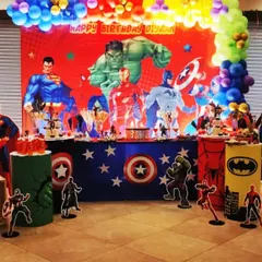 An epic Avengers and Justice League crossover party. This massive setup brings together all the favorite superheroes with a huge backdrop and multiple character standees.
