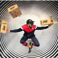 Our anti-gravity booths can be used to creatively showcase products. In this setup for JNE Express, the participant appears to be floating effortlessly with branded packages, creating a clever and visually engaging piece of marketing content.