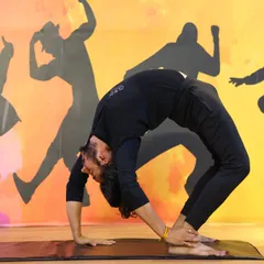 The foundation of our practice is on the mat. Poses like Chakrasana, or wheel pose, are fantastic for opening the heart, strengthening the entire back of the body, and boosting energy. We work with you to build up to these powerful asanas safely.