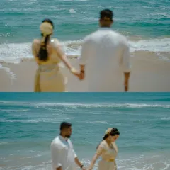A couple holding hands and looking out at the ocean. This shot, taken at a destination wedding in Chennai, captures a quiet moment of reflection before their big day.