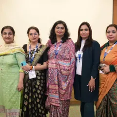 A group photo with other professionals at a conference. Connecting with peers and sharing insights is a vital part of my work. It helps me grow and offer better guidance.