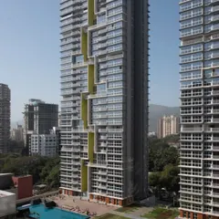 At the Serein residential complex, we designed extensive ground-level amenities, including a swimming pool and landscaped lawns. This creates a vehicle-free podium level that serves as a social heart for the community, promoting interaction and an active lifestyle.