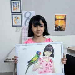 A beautiful self-portrait with a feathered friend. This student has been with us for a year and her growth in watercolor portraiture is amazing to see.