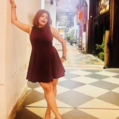 A full-length shot of my birthday outfit. The A-line silhouette of this maroon dress is universally flattering, and pairing it with metallic heels adds a touch of glamour for a night out.