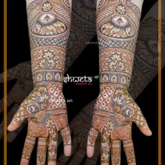 A beautiful blend of floral, peacock, and elephant motifs. This full-hand design is a great example of how I combine different traditional elements into one cohesive piece.