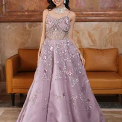 Eyes that whisper enchantment. This full-length shot shows off the beautiful lilac gown, perfect for a reception or engagement. The overall look is modern, romantic, and utterly captivating.