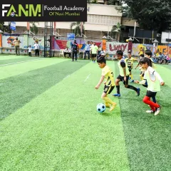 Young players engaged in a practice match at our Koparkhairane center.