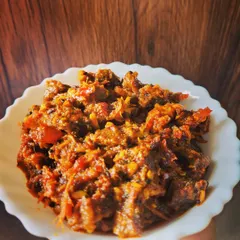 This is my homemade buff pickle, served and ready to be enjoyed. It's a non-veg pickle that carries the authentic taste of North-East India.