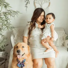 Because pets are family too. This shot from an indoor family session shows how we can include your beloved dog, creating a complete and joyful family portrait.