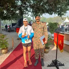A proud moment, receiving my medal at the Kargil Vijay Diwas Honour Run, standing alongside an army officer.