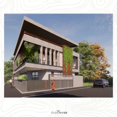 The 'Ayana' residence in Gulbarga is designed for a harsh, dry climate. The facade features vertical louvers and integrated green walls that act as a shading screen, promoting natural air circulation while creating a unified, contemporary aesthetic.