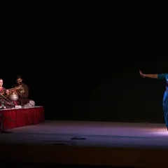 A wide view of the stage during a solo recital, with the live orchestra providing the soul-stirring Carnatic music. The interplay between the mridangam, violin, vocals, and my ghungroos creates a truly complete and immersive experience.