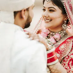 A beautiful, happy moment between Samridhi and Pratik during their Goa wedding. Her makeup looks fresh and radiant, capturing the pure joy of their celebration.