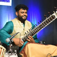 A happy moment from a live classical concert. Performing on stage is a joy, and this experience helps me bring energy and precision to live band studio recordings.