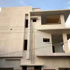 The Arun Reddy residence during construction. This photo shows the building's core structure taking shape, matching the forms established in the 3D model before the final facade materials were applied.