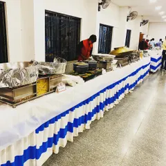 This is an example of a straightforward and clean buffet arrangement for an indoor event. No matter the scale, I ensure the setup is professional, hygienic, and well-organized.