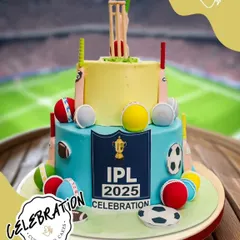 Hit it out of the park with this incredible IPL-themed cricket cake. This two-tier design is ready for a super over, decorated with bats, balls, and the IPL trophy.