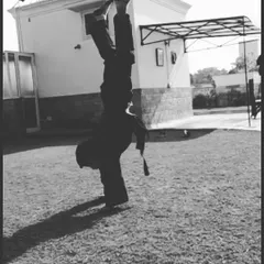 We build all-around athletes. This student is holding a perfect handstand, which requires core strength, balance, and concentration. Our training incorporates gymnastic and conditioning elements to develop complete body control.