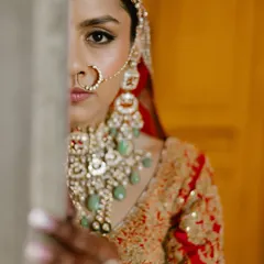This artistic shot highlights the intensity of the kohl-rimmed eyes, a key feature of this traditional bridal look. It’s about creating a gaze that is both powerful and soulful.